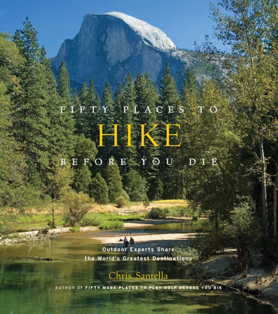Book cover of 'Fifty Places to Hike Before You Die' with a scenic mountain and forest background.