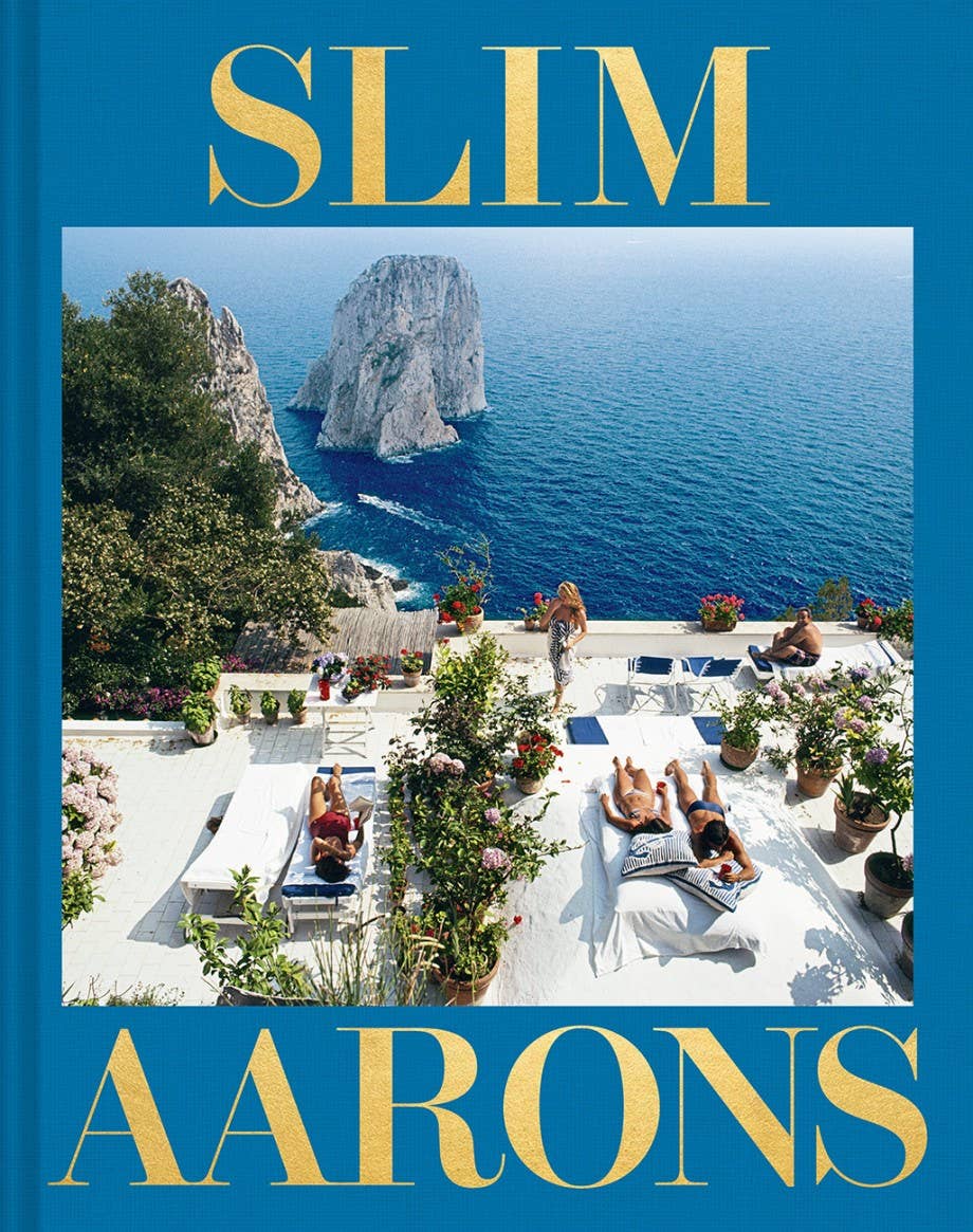 Book cover with scenic view of Capri Island and 'Slim Aarons' branding.