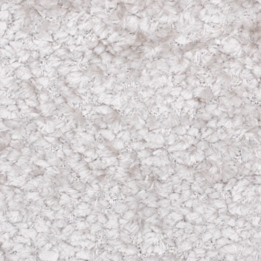 Close-up of a textured beige surface