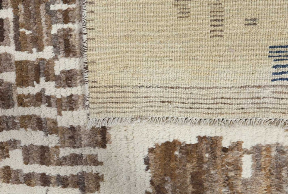 Close-up of a textured rug with geometric pattern