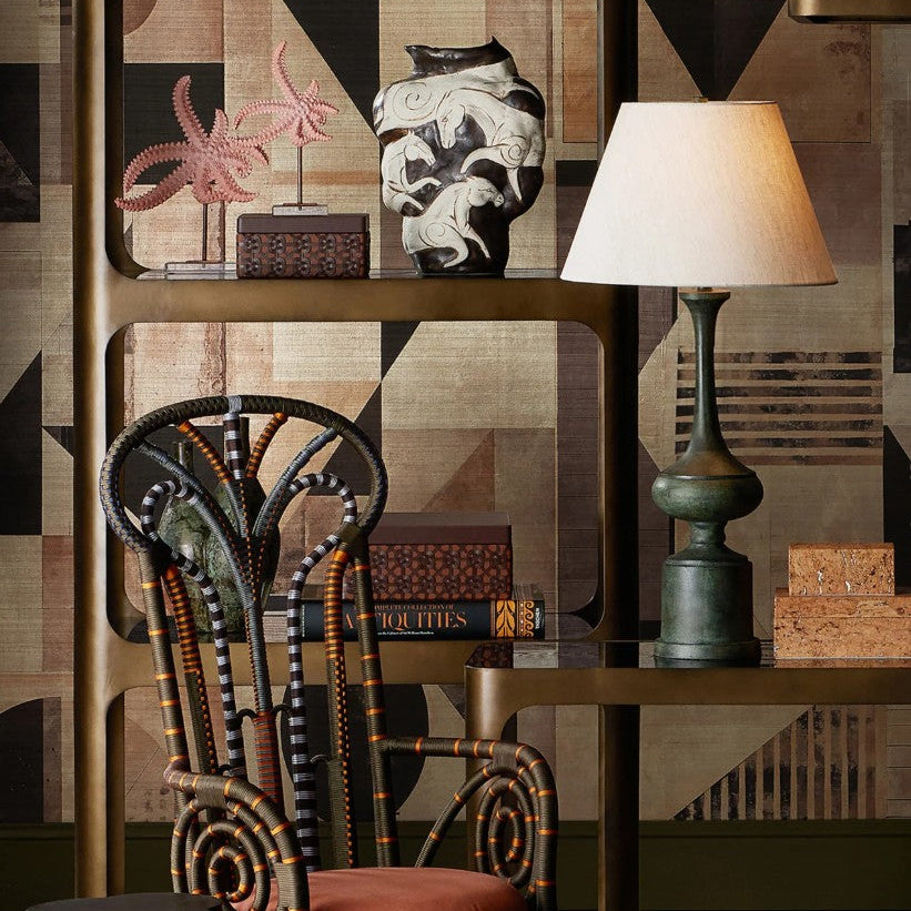 Black and White Vase with painted horses on a shelf in a room.