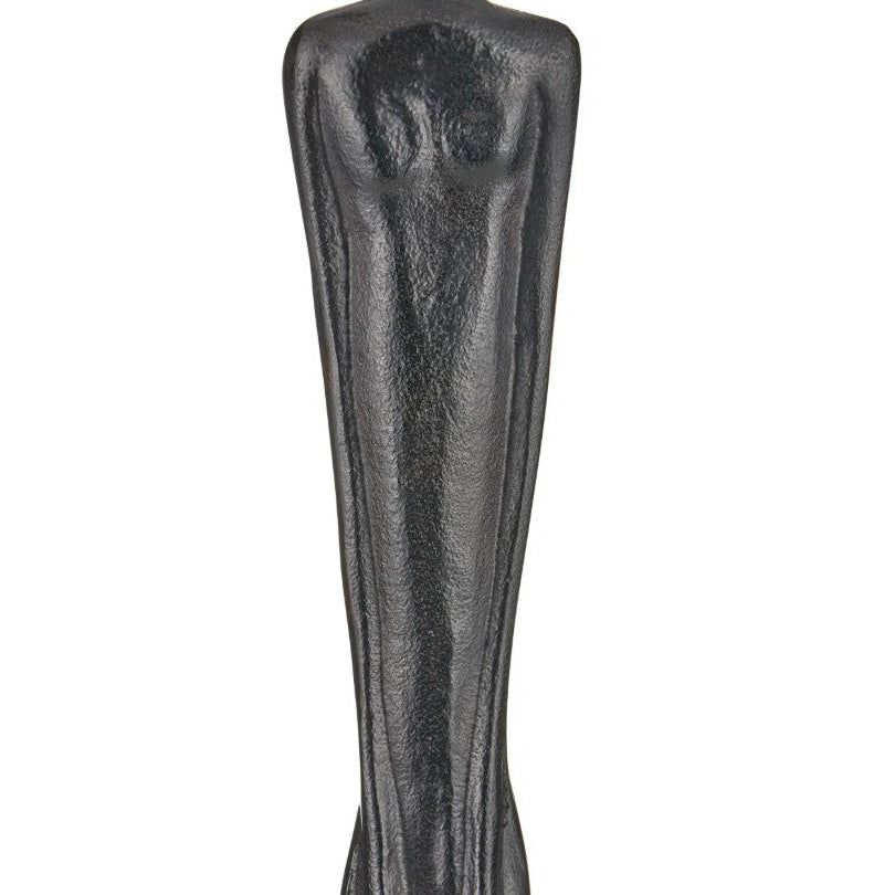 A black cast iron leg warmer or bootie holder with a textured, rustic finish, shown vertically on a plain white background.