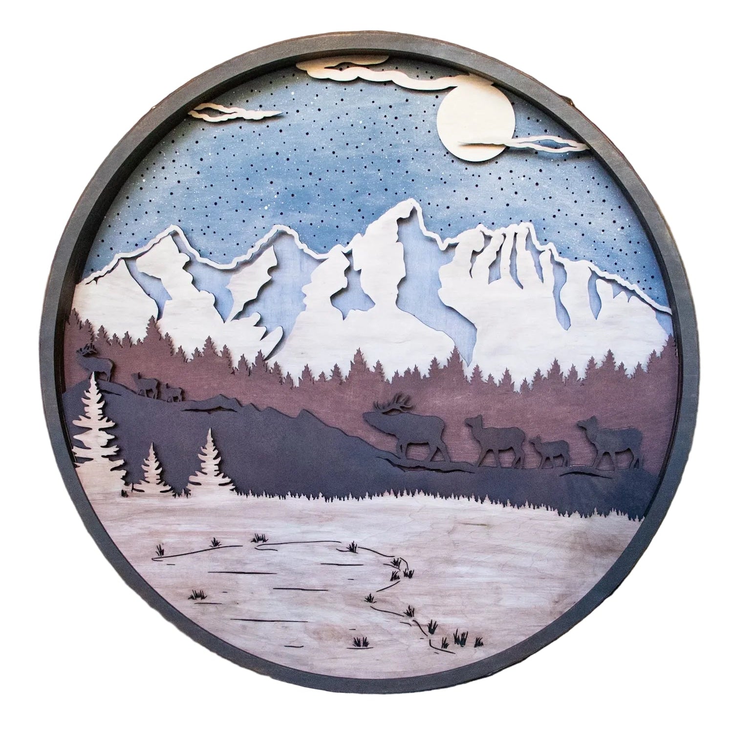 Wooden wall art depicting a mountain landscape with deer and a moonlit sky.