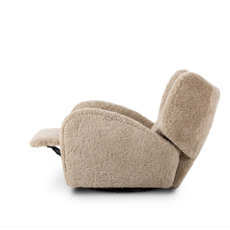 A plush, low-profile recliner chair upholstered in a textured, sherpa-like fabric in a light beige color, shown from a side profile on a white background.