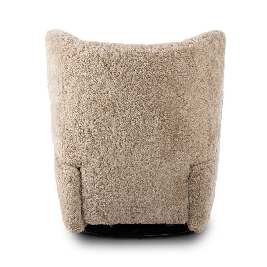 A beige shaggy faux fur chair cover with a curved top edge and side pockets, shown from the back on a white background.