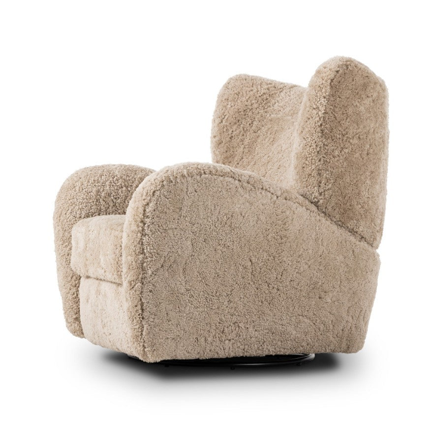A plush, rounded swivel armchair upholstered in a textured bouclé fabric in a light beige color, shown from a three-quarters angle on a white background.