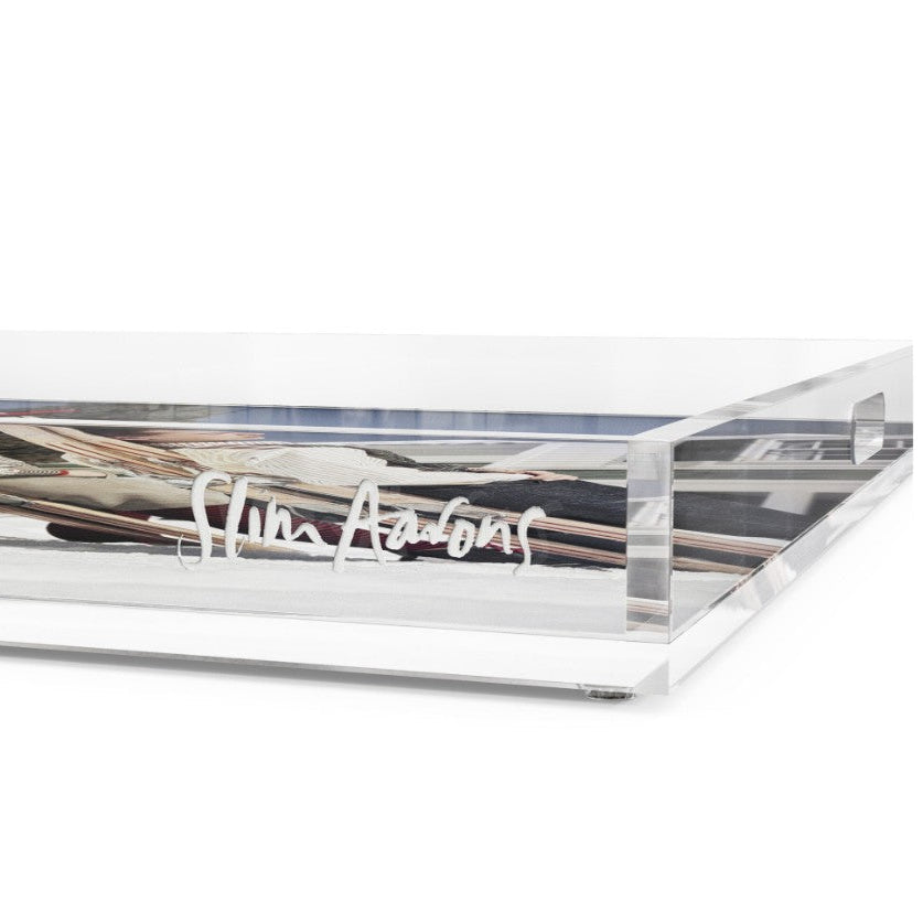 A clear acrylic storage tray with a white lid, featuring a white script logo that reads 'Sine Adonis' on the front, set against a plain white background.