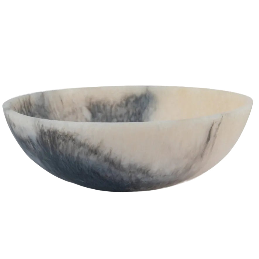 A round stone bowl with a marbled pattern of cream, beige, and dark gray, shown against a plain white background.