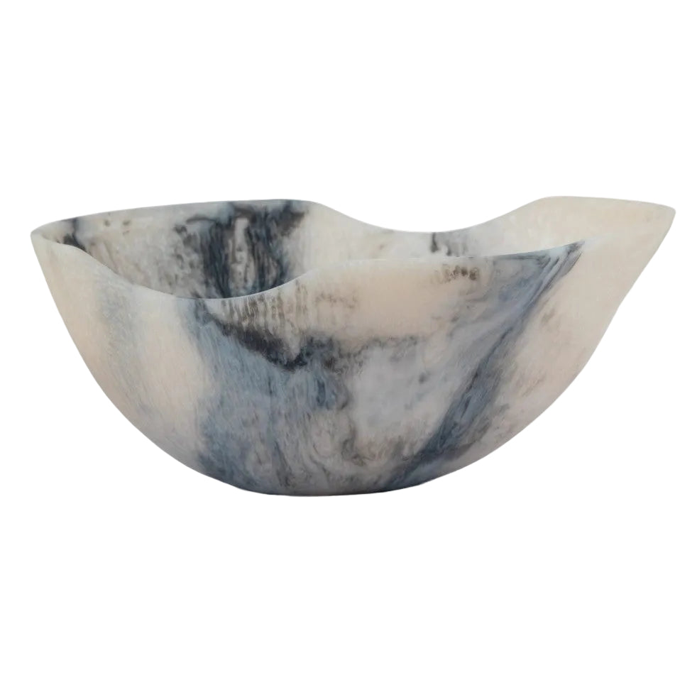 A handcrafted stone bowl with a marbled pattern of cream, beige, and slate blue-gray, shown against a plain white background.