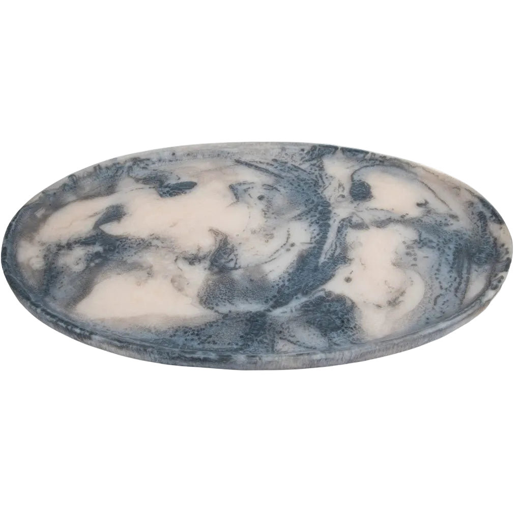 An oval stone tray with a marbled pattern of slate blue and cream, shown on a plain white background.