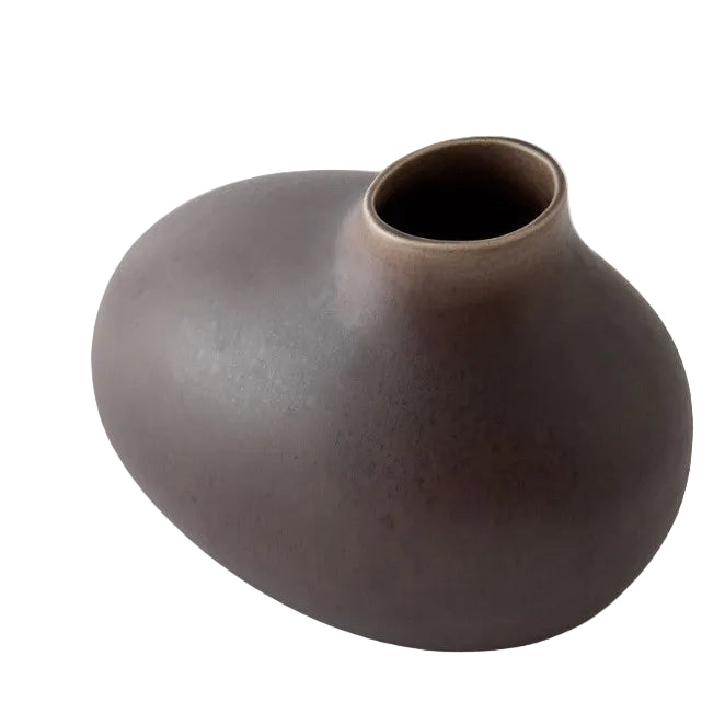 Brown ceramic vase on a white background