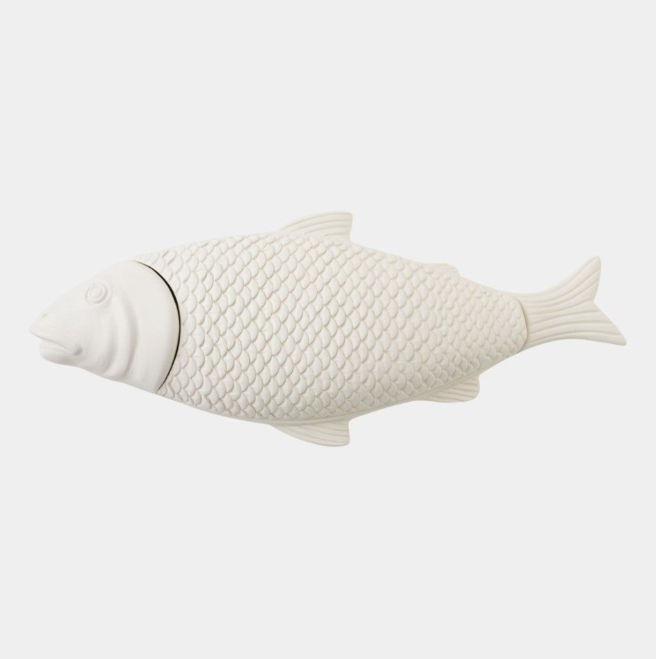 White fish-shaped object on a light gray background