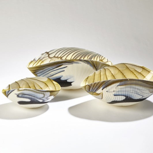 Set of three decorative bowls with gold and black patterns on a white background