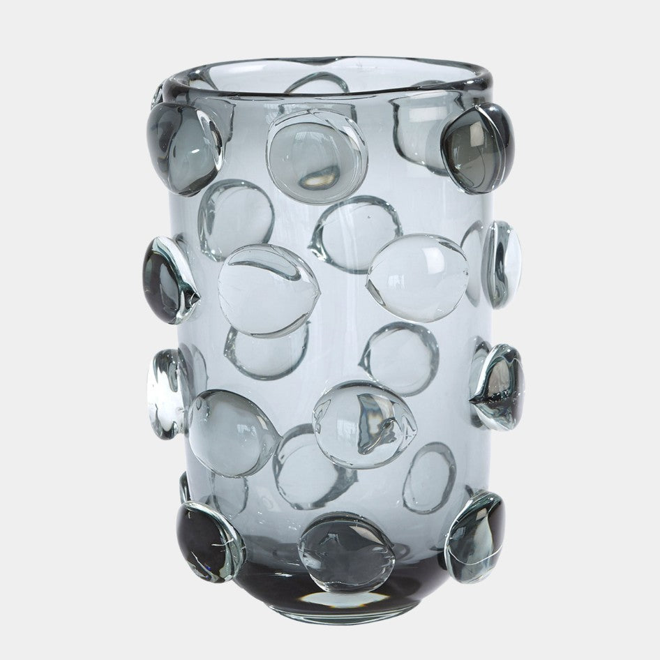 Glass vase with bubble design on a white background