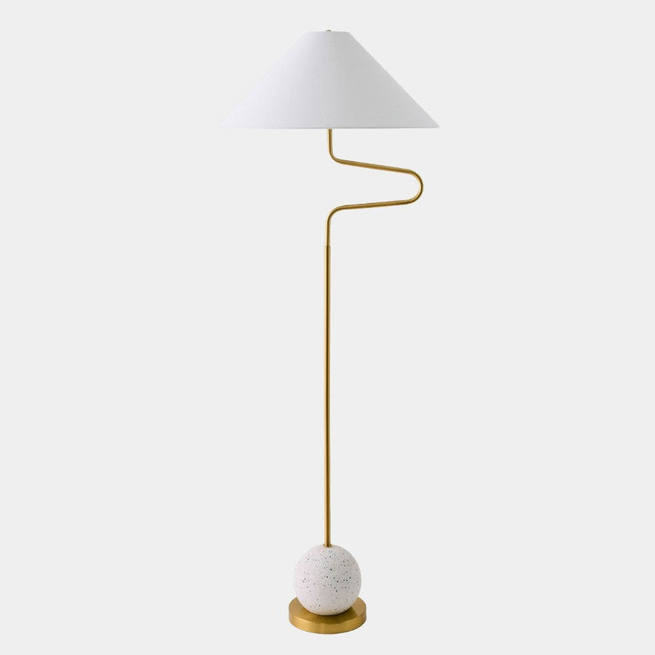 Floor lamp with white shade and gold base on a light gray background