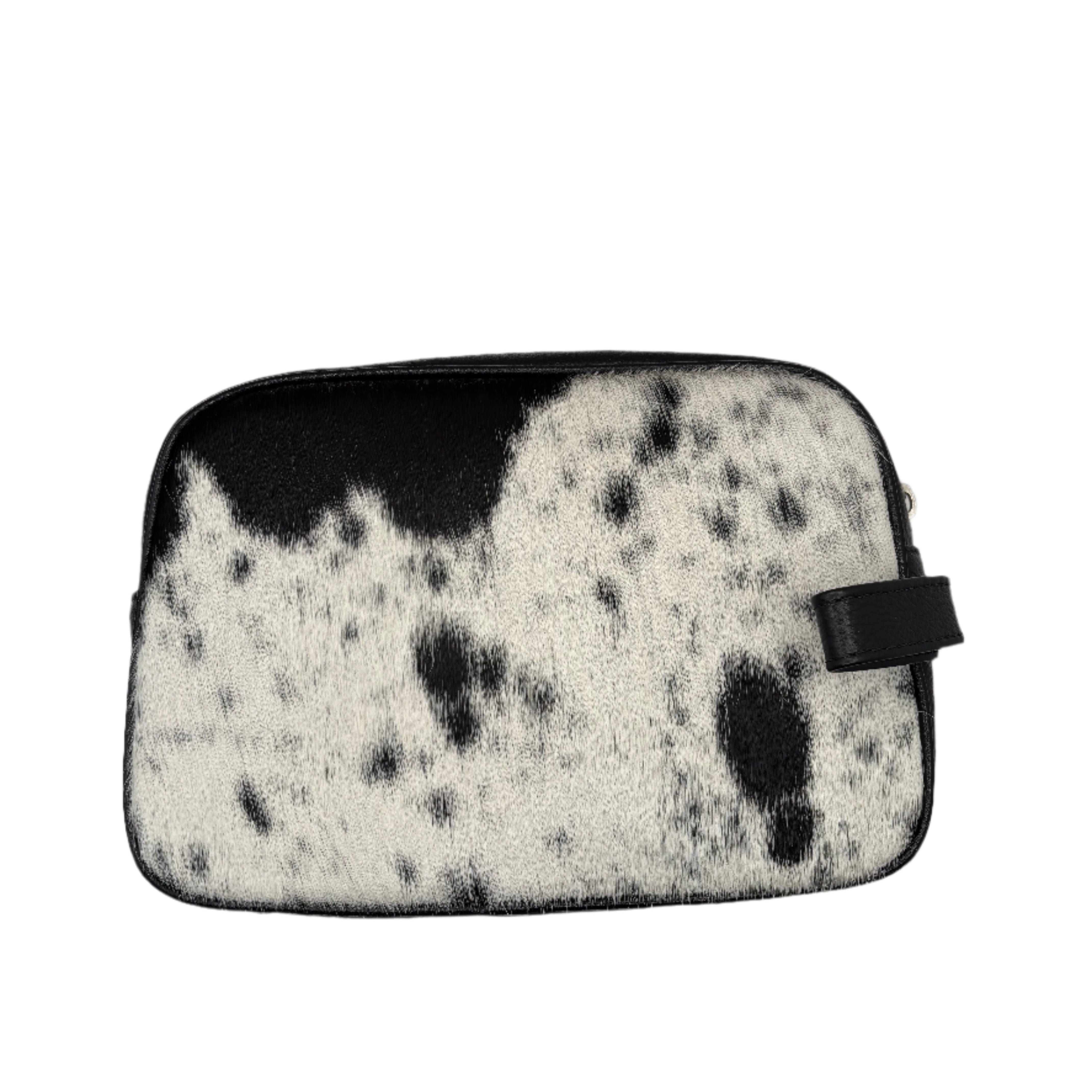 A cowhide leather necessaire bag with a side strap, showcasing a natural brown and white pattern.