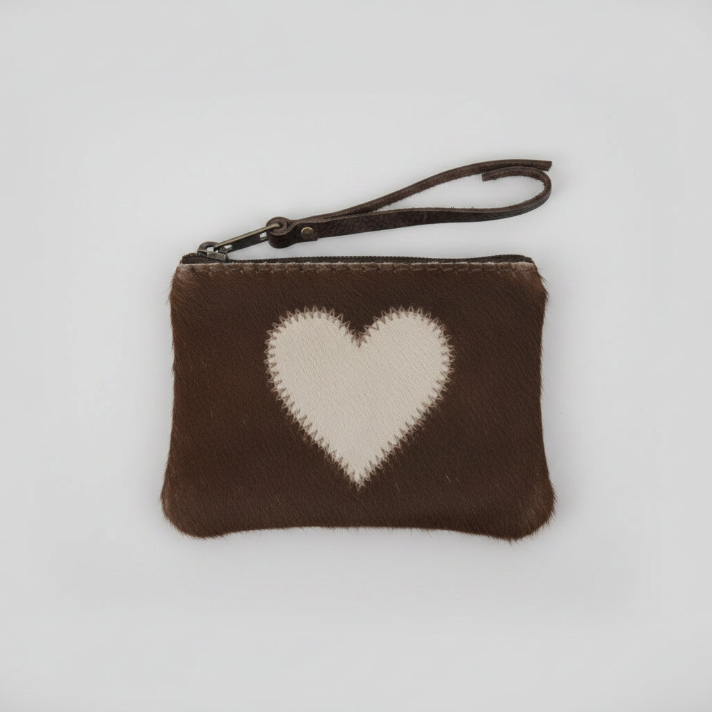Brown pouch with a white heart design on a light gray background