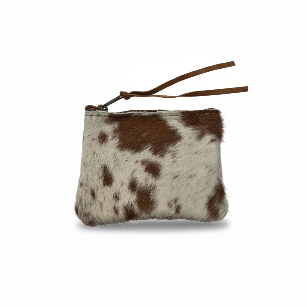 Cowhide pouch with brown and white pattern on a white background
