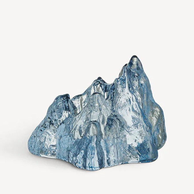 Blue mountain sculpture on a white background