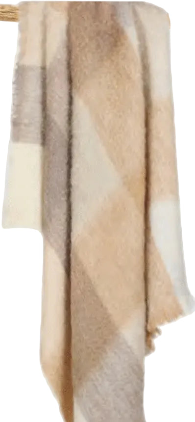 Plaid blanket with beige, brown, and white colors on a wooden rack.