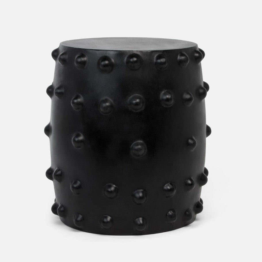 Black textured stool on a white background