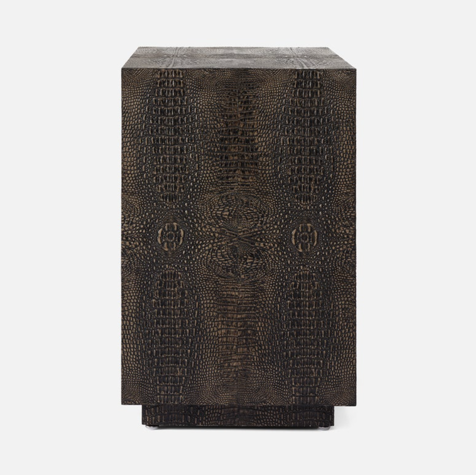 A dark brown textured side table with a crocodile skin pattern, shown against a light gray background.