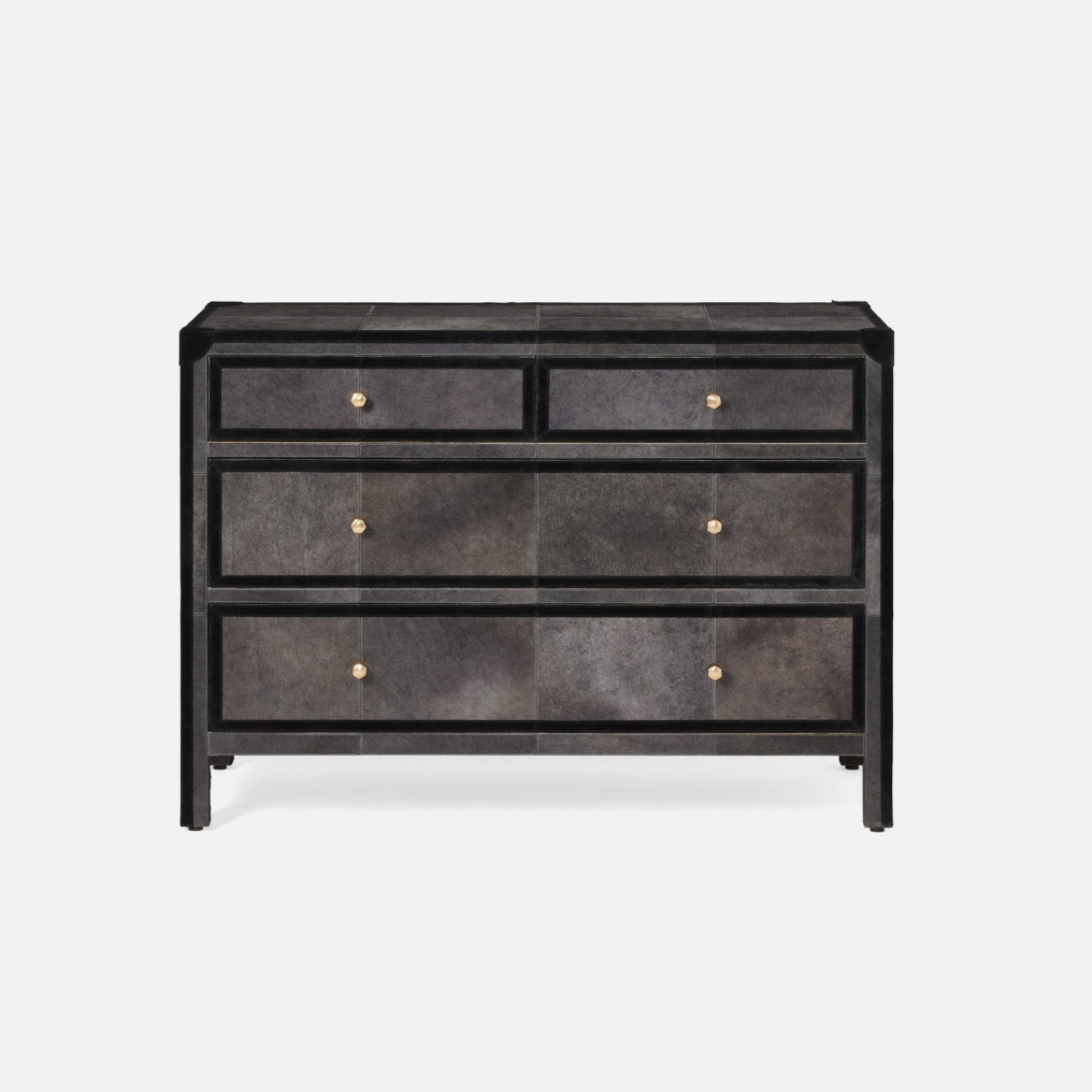 A three-drawer dresser with a black frame and textured dark gray shagreen drawer fronts, accented with small gold knobs, shown against a plain white background.
