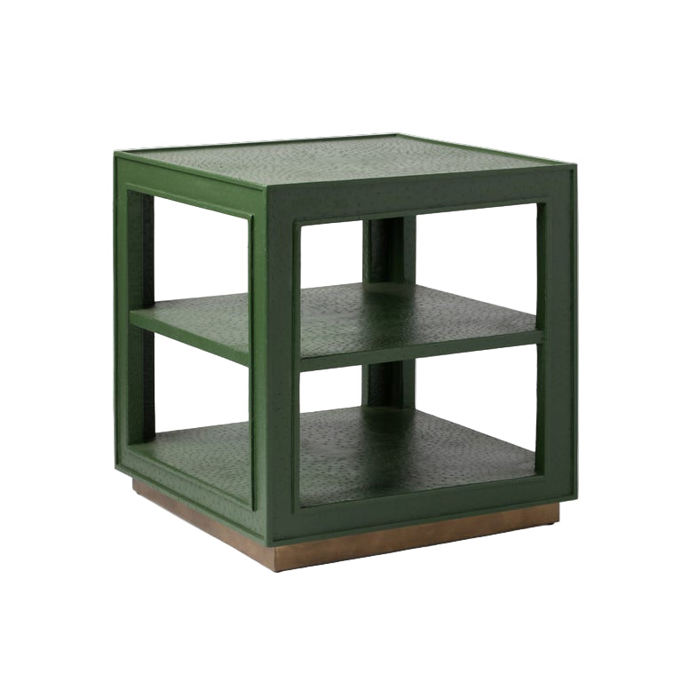 Green side table with textured surface on a white background