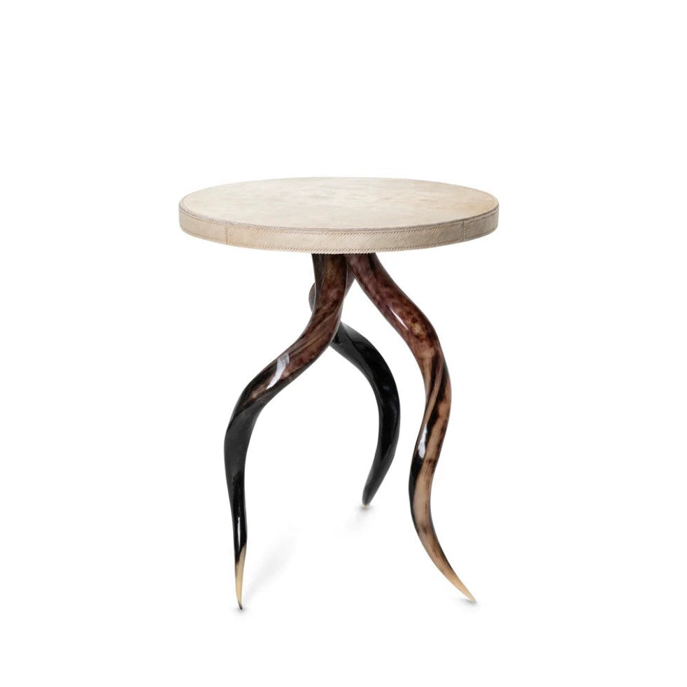 Round table with unique horn-like legs on a white background