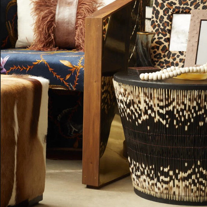 Decorative living room with patterned furniture and decor