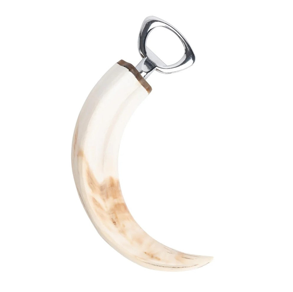 Decorative item resembling a large cowbell on a white background