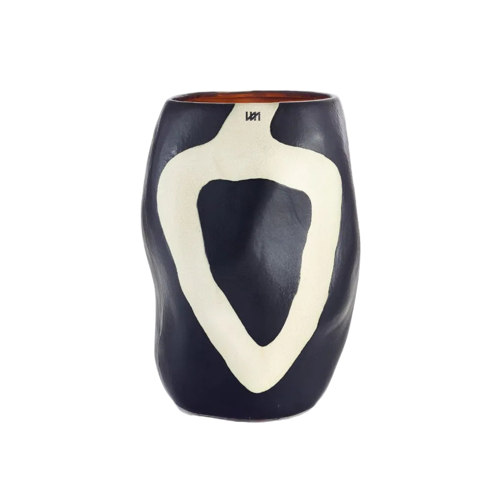 A black ceramic vase with an organic, wavy silhouette and a large cream-colored abstract shape on the front, featuring the brand name 'LARI' near the rim.