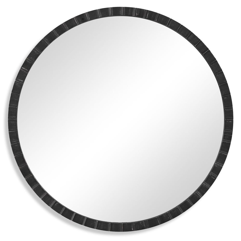 A circular mirror with a black frame, potentially featuring hand-crafted details as part of a mirror set.