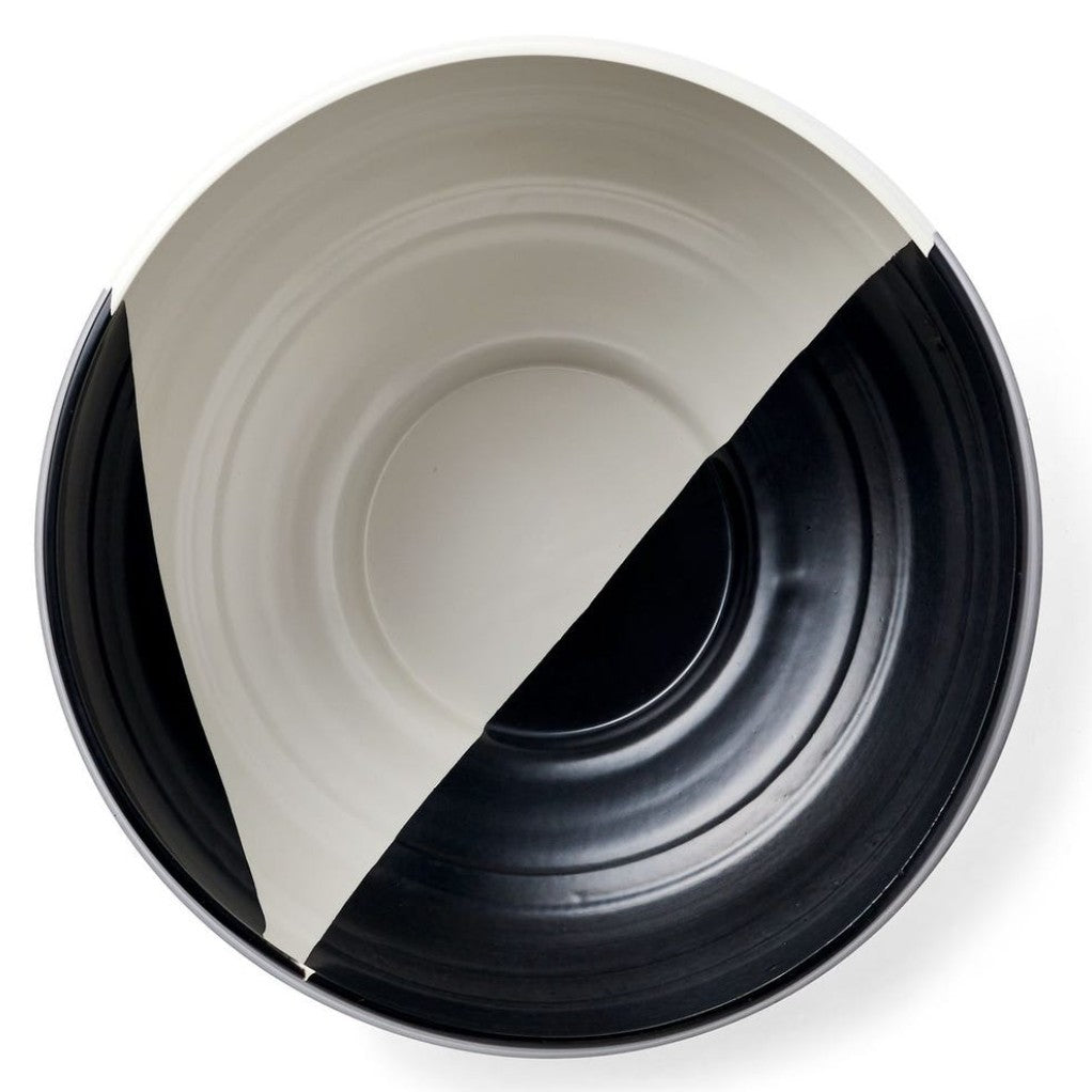 Black and white circular object on a white background