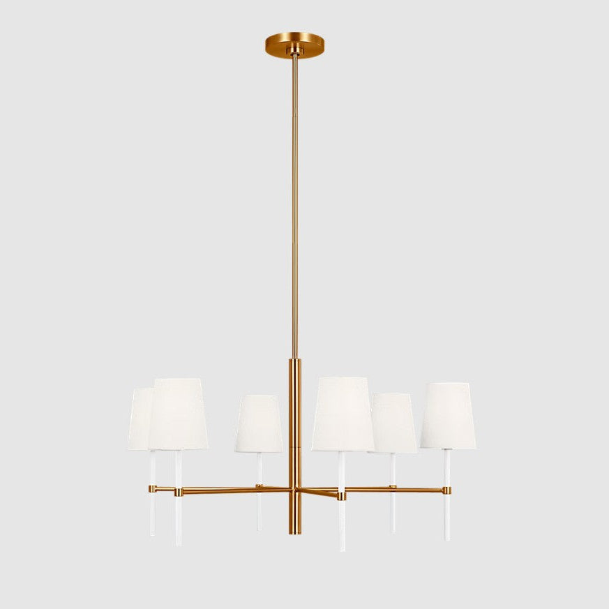Modern chandelier with gold finish and white shades on a light gray background
