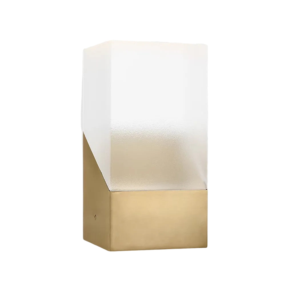 Wall-mounted light fixture with white glass shade and gold base on a light gray background