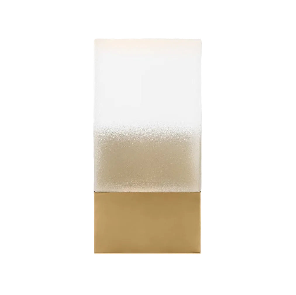 Rectangular object with beige top and gold bottom on a light gray background