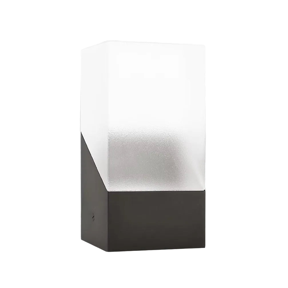 Wall-mounted outdoor light fixture with a black base and white glass cover on a gray background