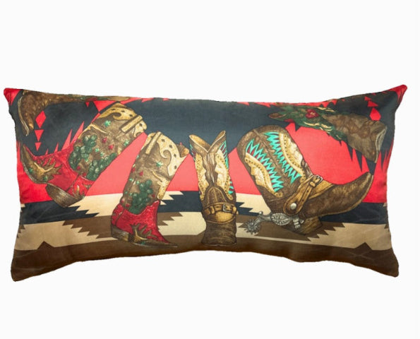 Decorative pillow with cowboy boots design on a red and black background