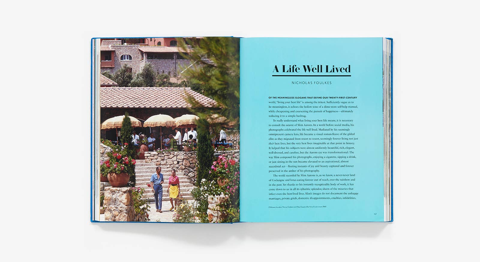 Open book showing a scenic outdoor setting with people and a title page.