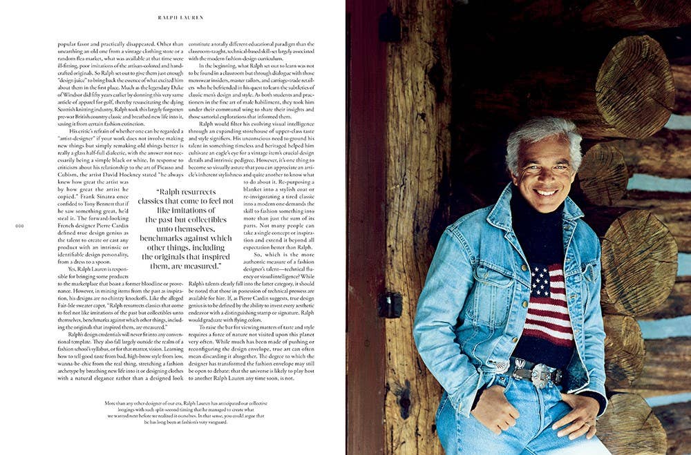 Person wearing a denim jacket with an American flag shirt, standing in front of wooden logs.