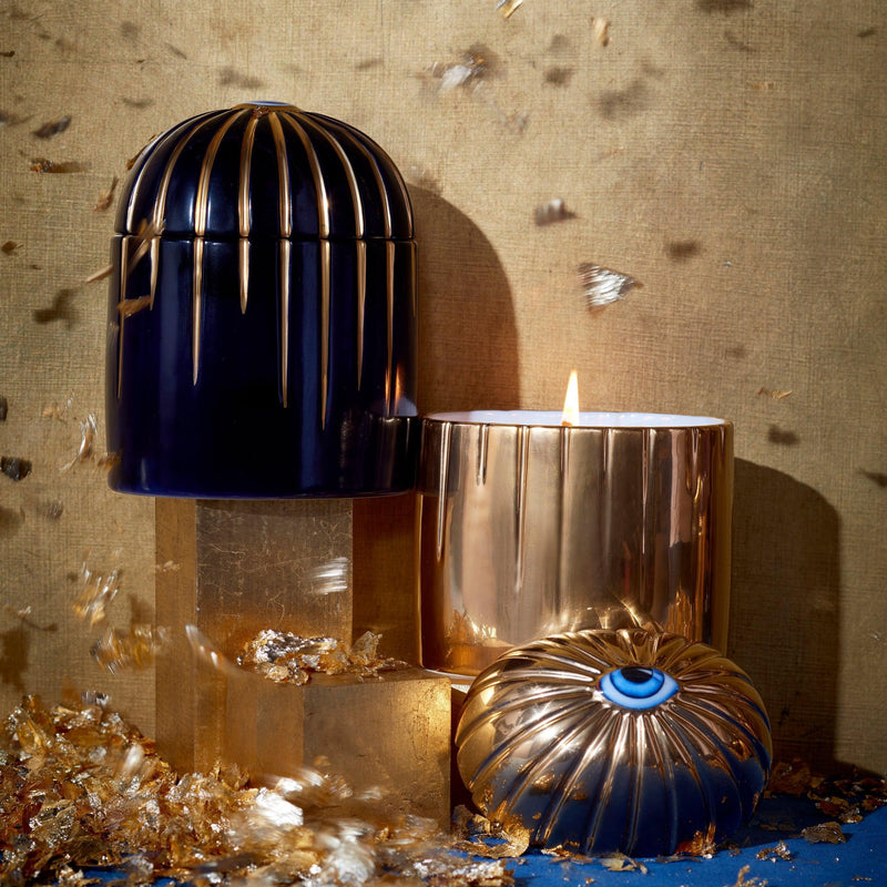 L'Objet Lito Candle Bleu top view showing bold hand-painted eye detail in cobalt blue and gold
